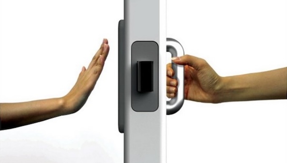 A door with a push panel on one side and a pull handle on the other, with hands demonstrating the affordance
